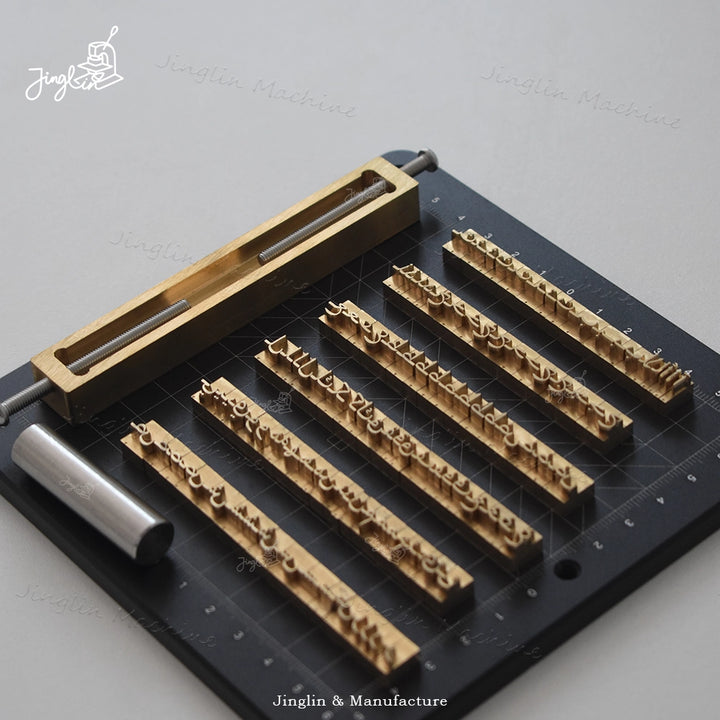 Close-Up of the Solid Brass Arabic Letter Stamps Showing Their Weight and Quality Finish. Designed for Comfortable and Accurate Hand Stamping on Leather.