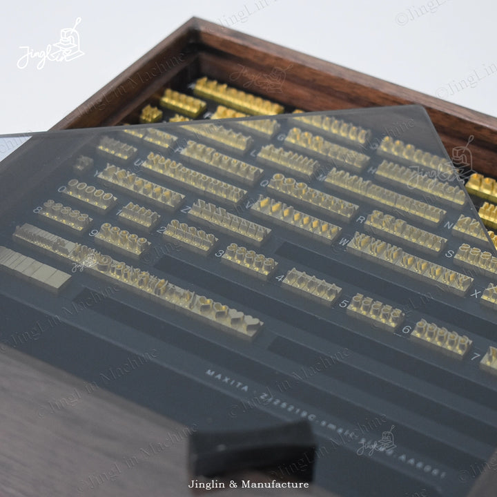 Letter Stamps Contained Within a Walnut Storage Box.