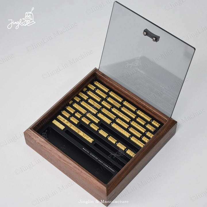 Maxita 306-Piece Letter Stamp Set Fully Displayed, Including Letters, Numbers, Symbols, And Spacers.