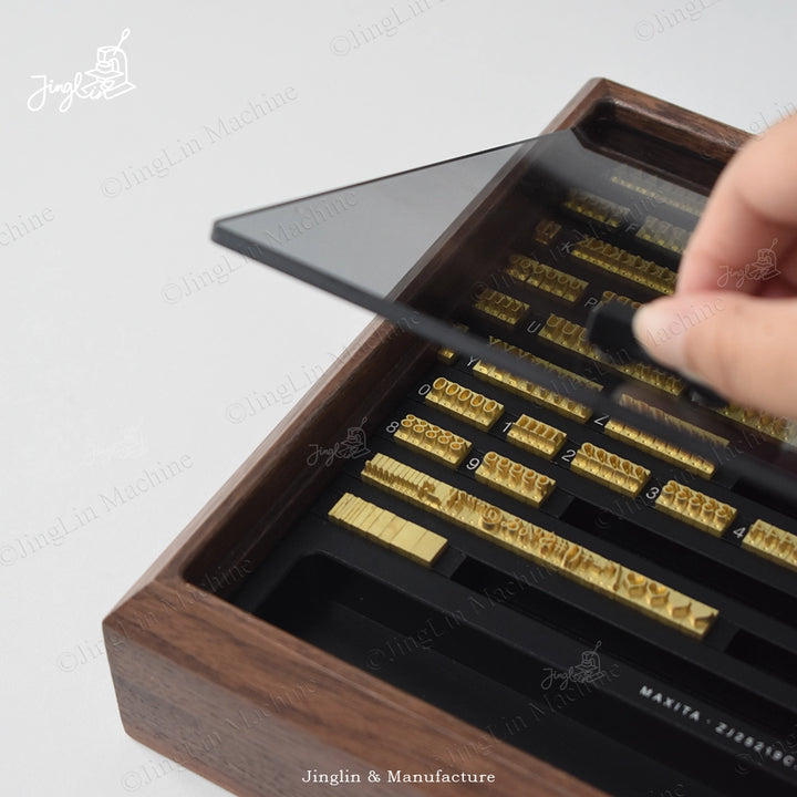 Maxita Letter Stamps in a Close-Up Shot, Highlighting the Brass Modules.