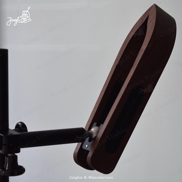 Side View of the Maxita Stitching Pony, Highlighting the Streamlined Wooden Head and Its Connection to the Metal Rod.