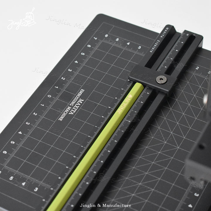 Pencil Resting Securely on the Maxita Pencil Holder Attachment, Positioned for Alignment Checks Before Hot Stamping.